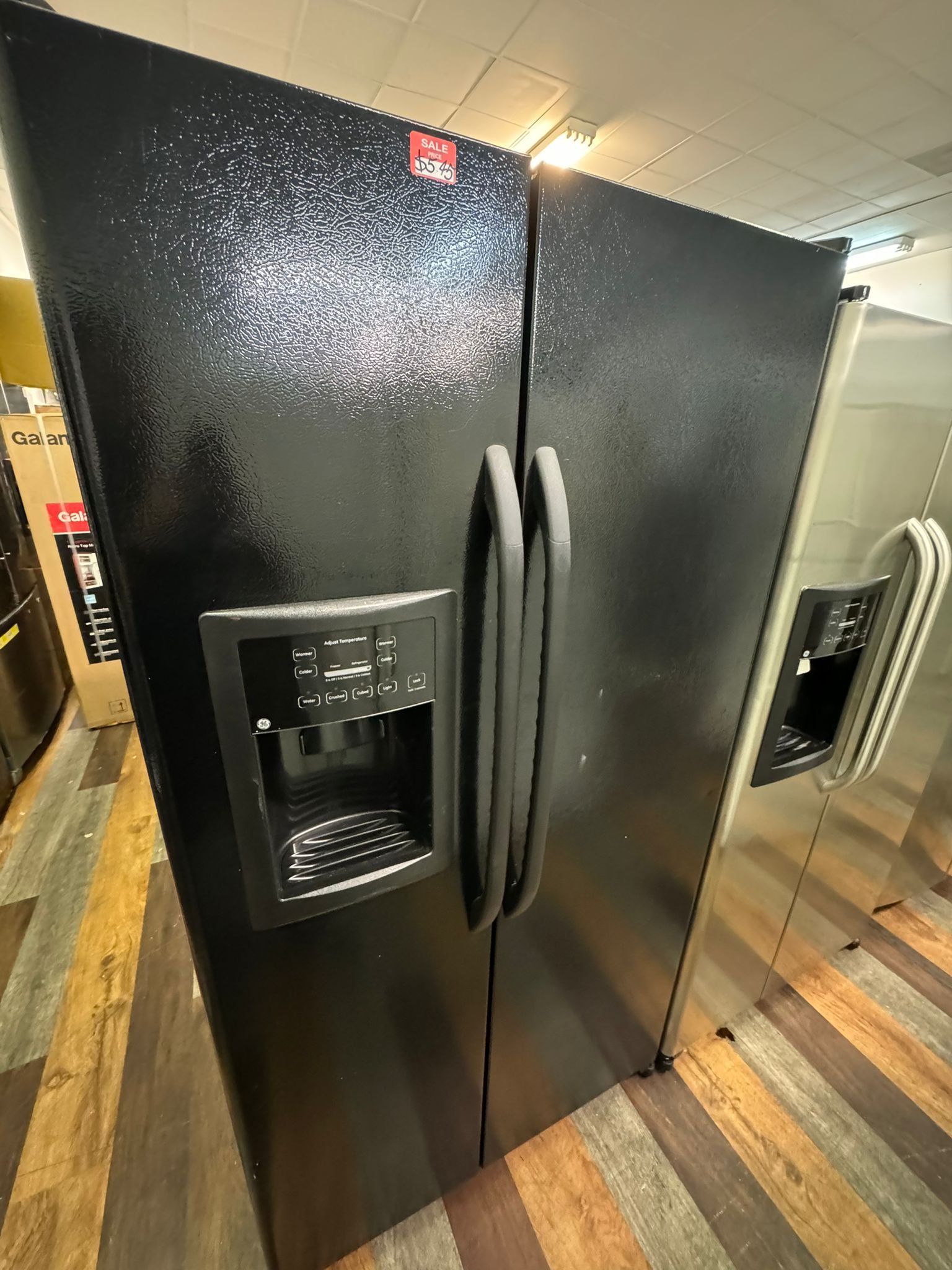 : GE Refurbished Black 25.0 Cu. Ft. Side-By-Side Refrigerator with Dispenser