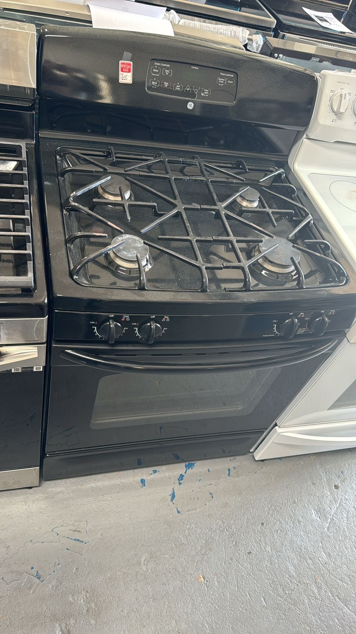 GE New Scratch And Dent Black Gas Stove – Freestanding